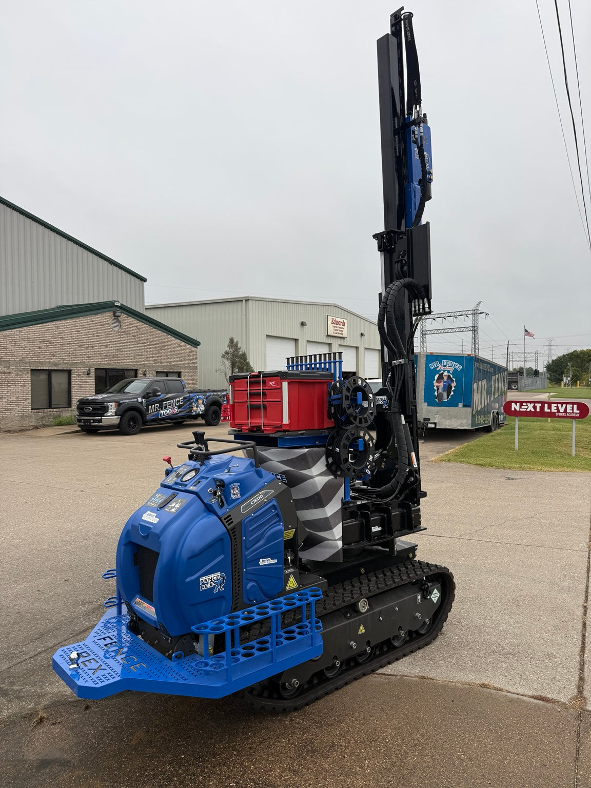 Fence Rex post driver front view with mast extended