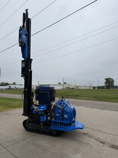 Fence Rex post driver with mast fully extended